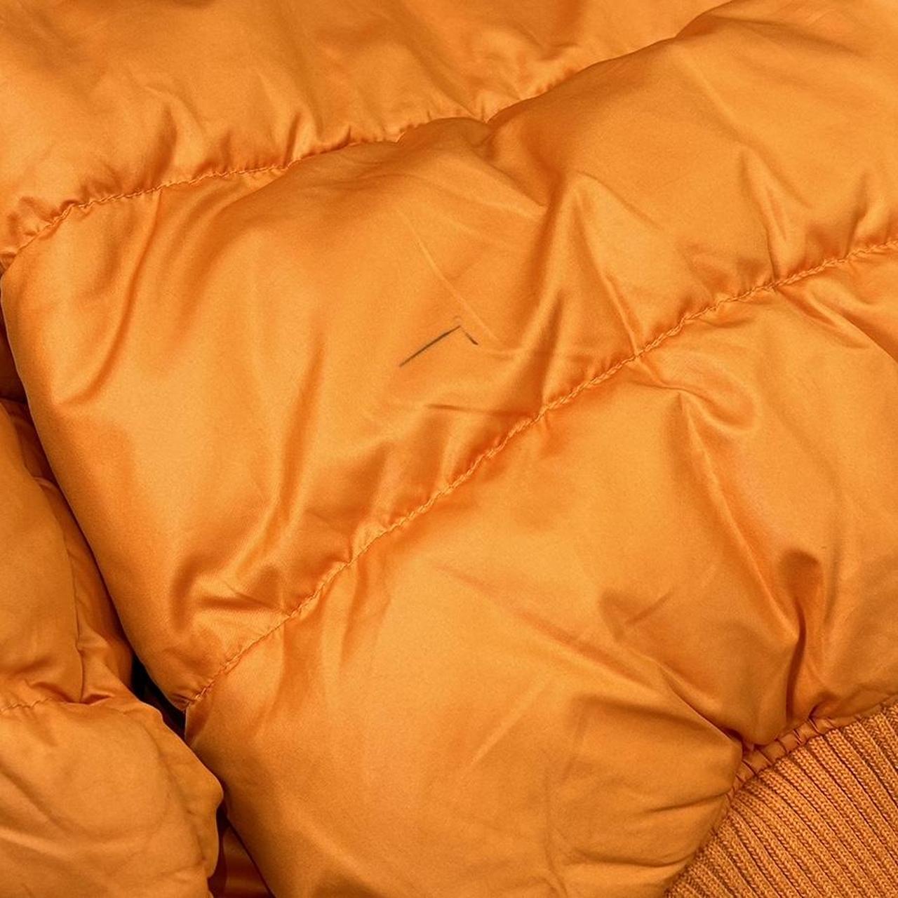 Vintage y2k style orange puffer jacket