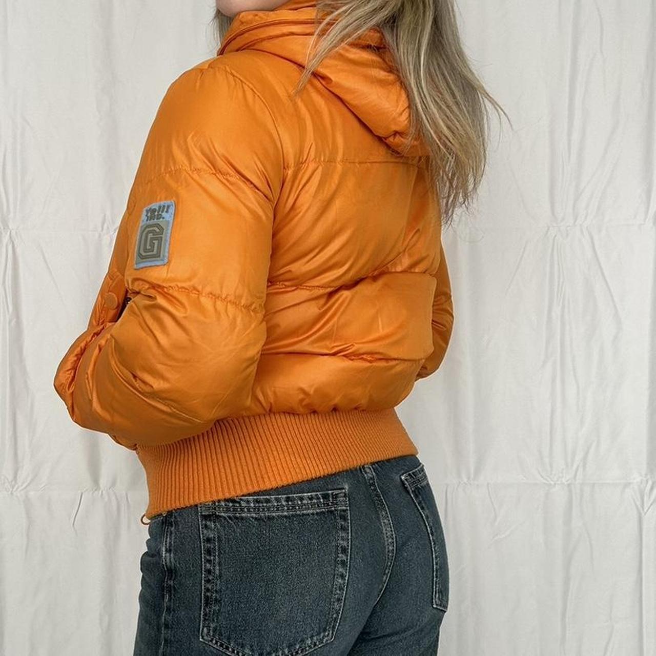 Vintage y2k style orange puffer jacket