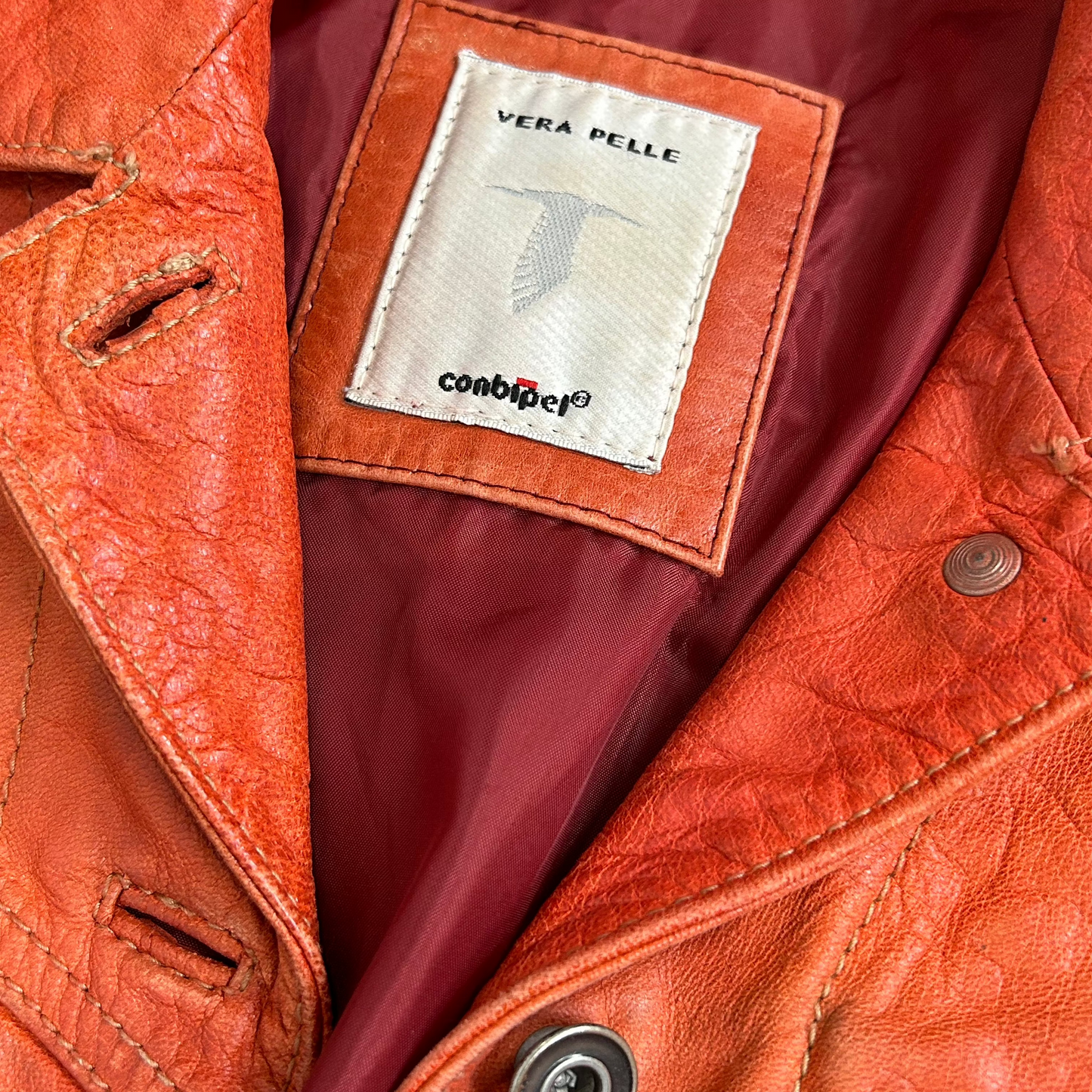 Vintage y2k style orange cropped leather jacket