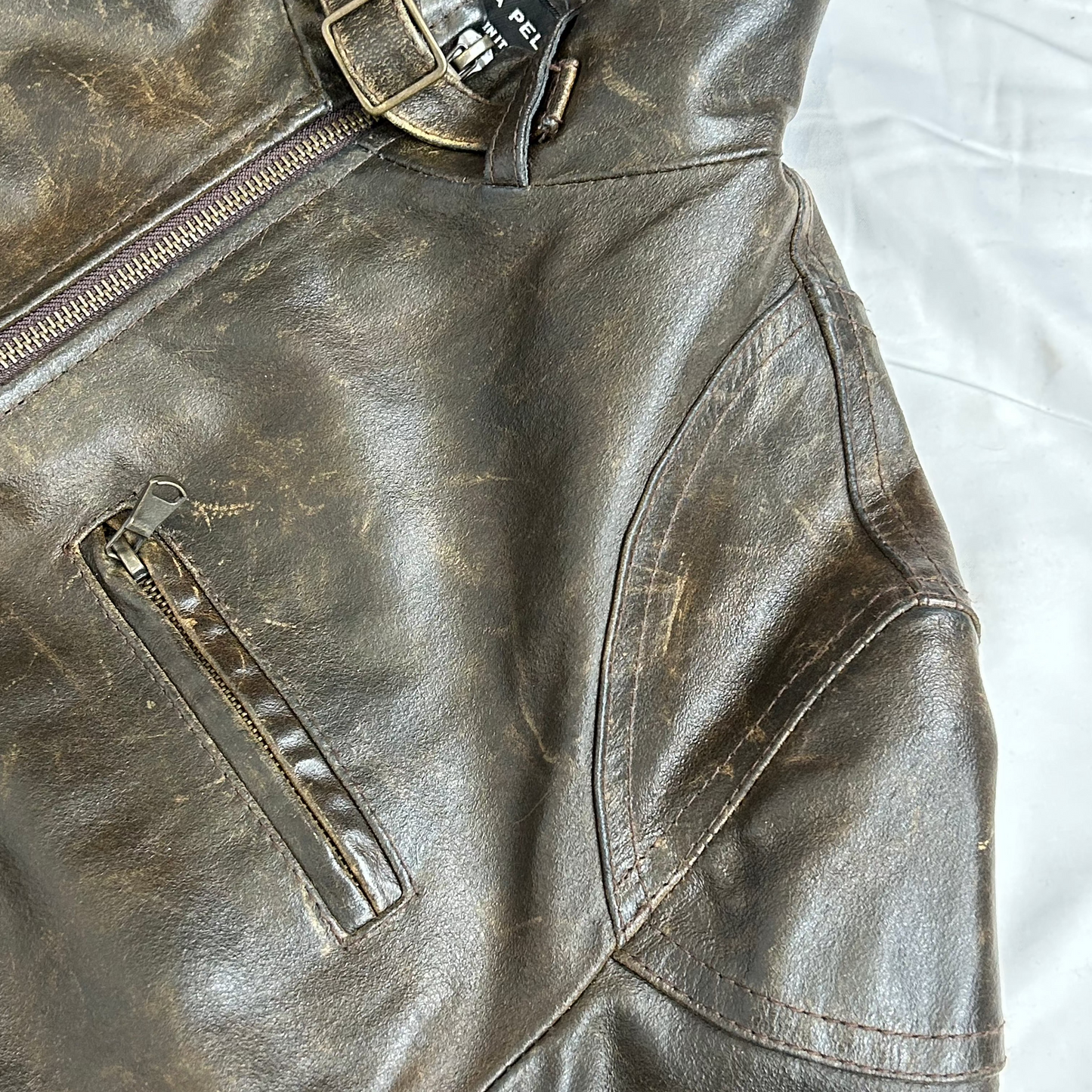 Vintage y2k style distressed brown leather moto jacket