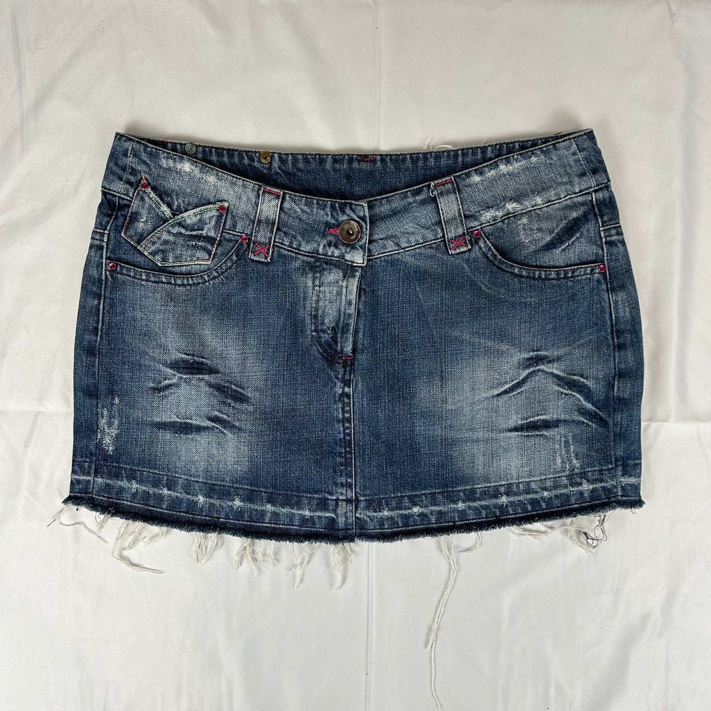 Vintage y2k style dark wash distressed denim mini skirt