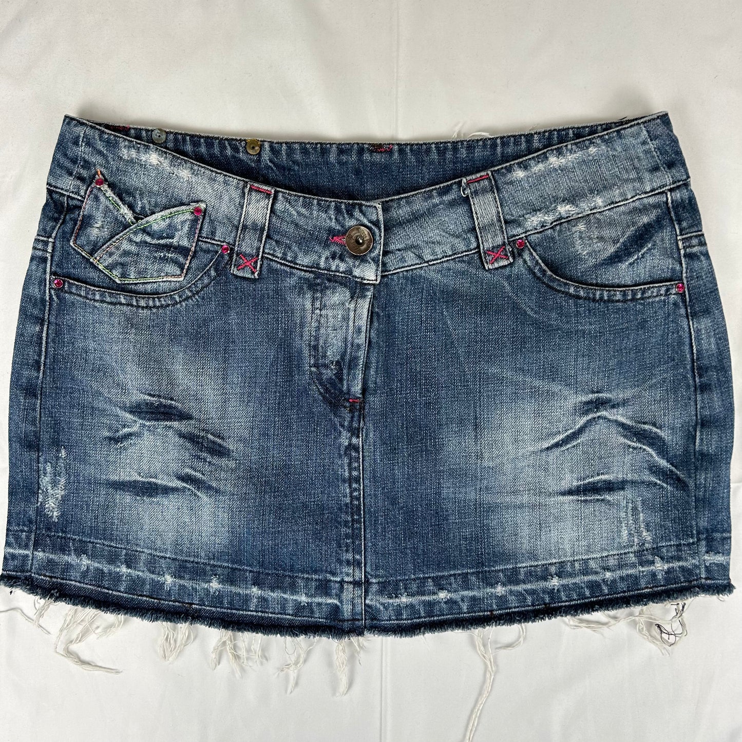 Vintage y2k style dark wash distressed denim mini skirt