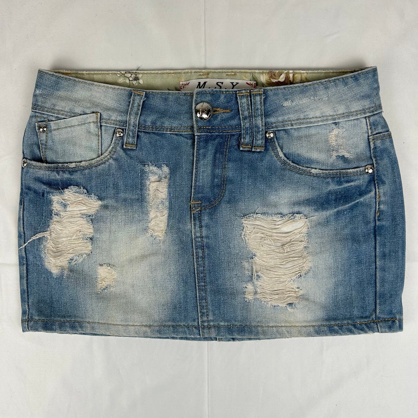 Vintage y2k style distressed denim mini skirt