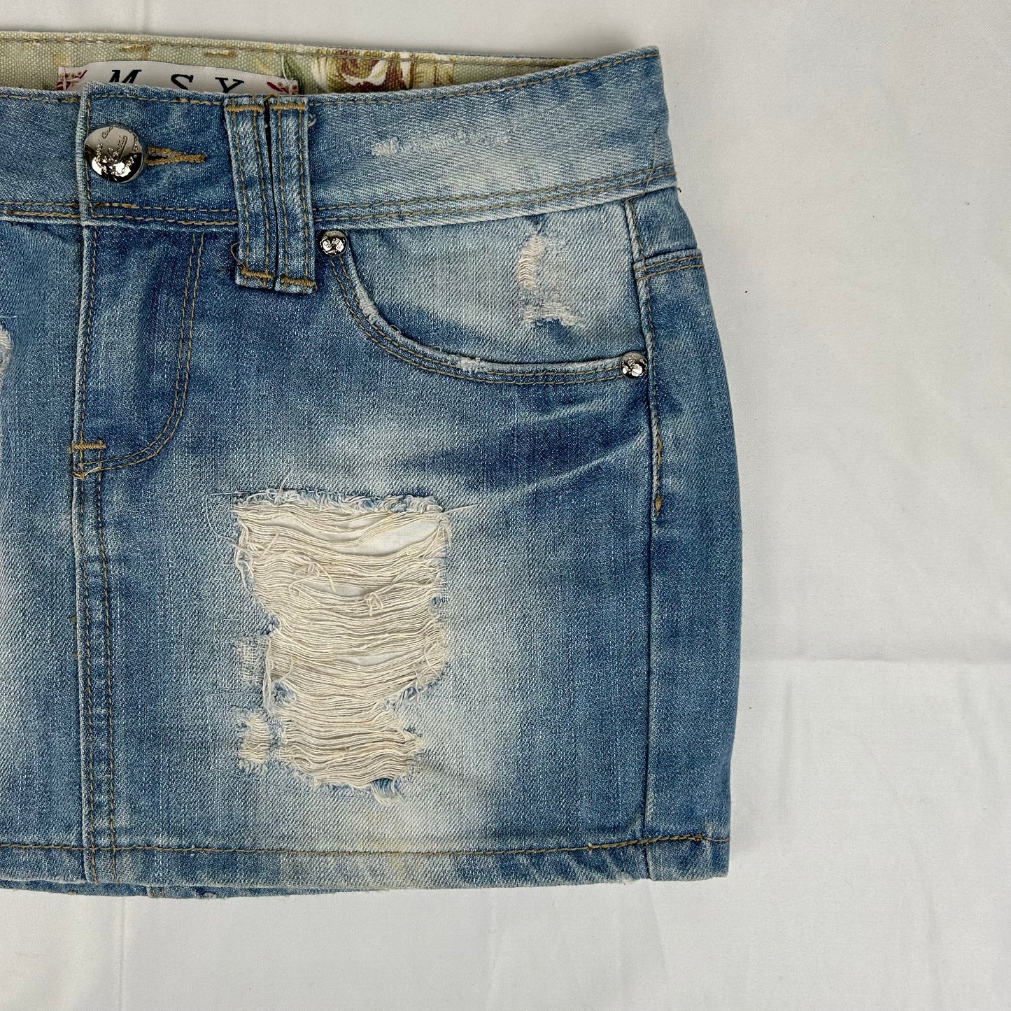 Vintage y2k style distressed denim mini skirt