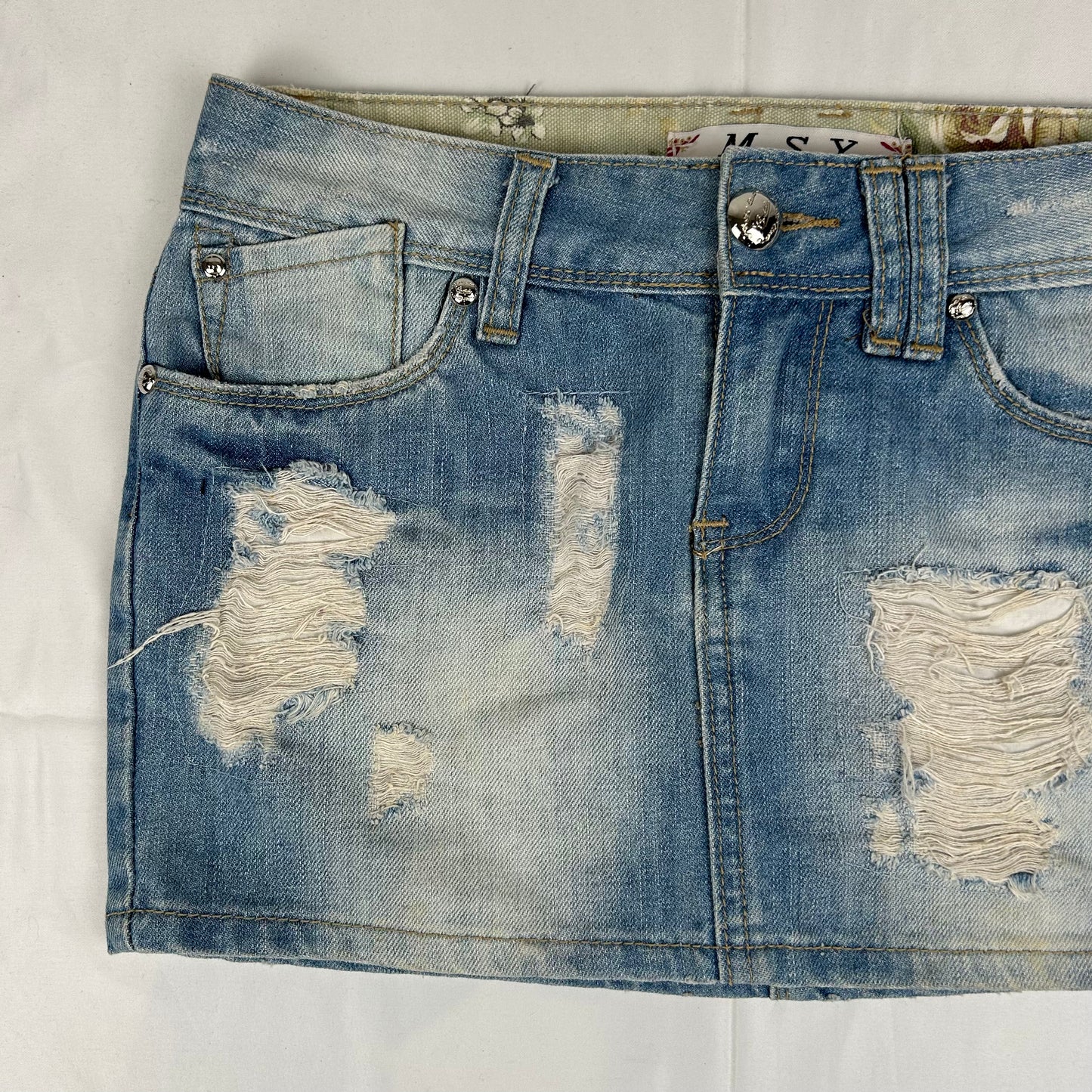 Vintage y2k style distressed denim mini skirt