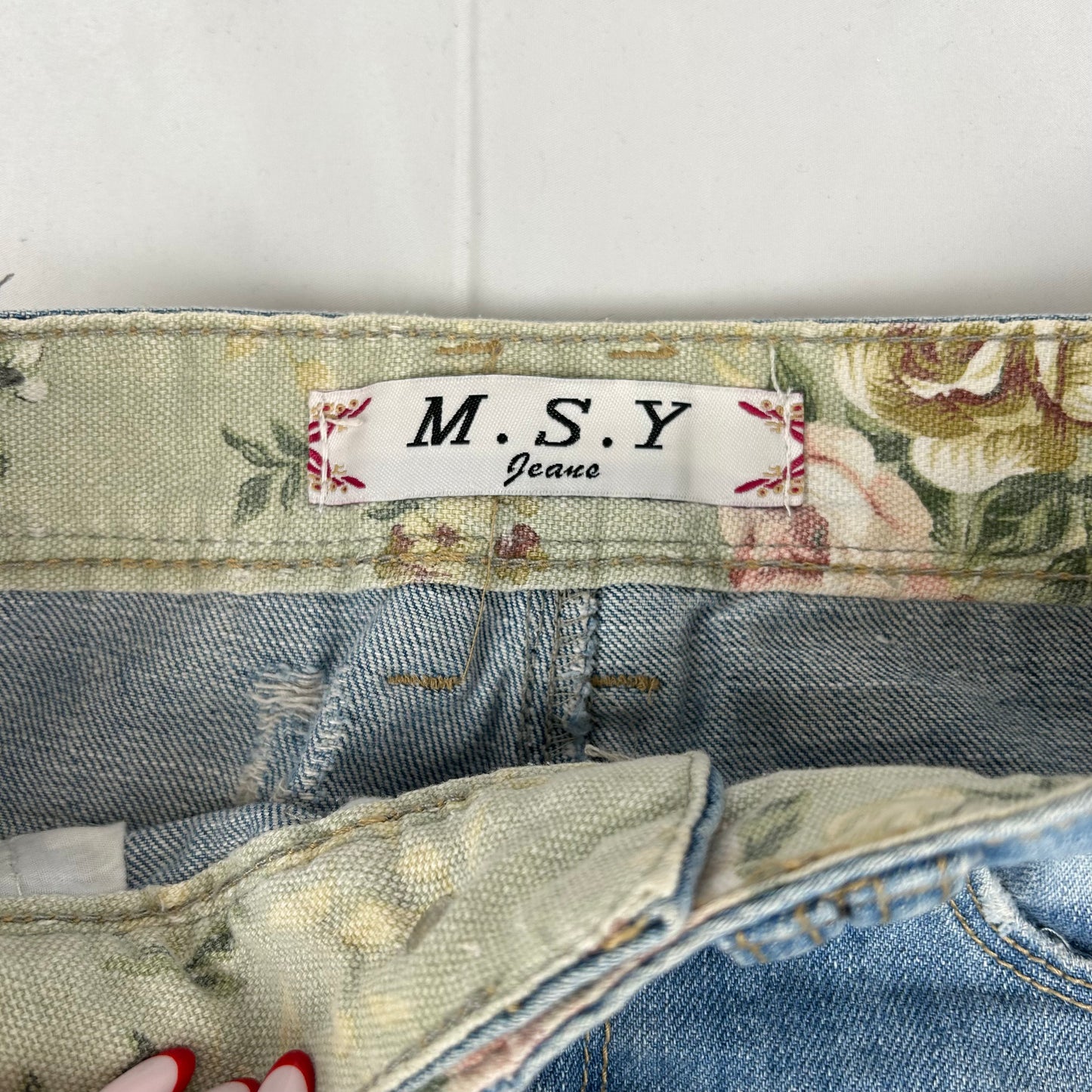 Vintage y2k style distressed denim mini skirt
