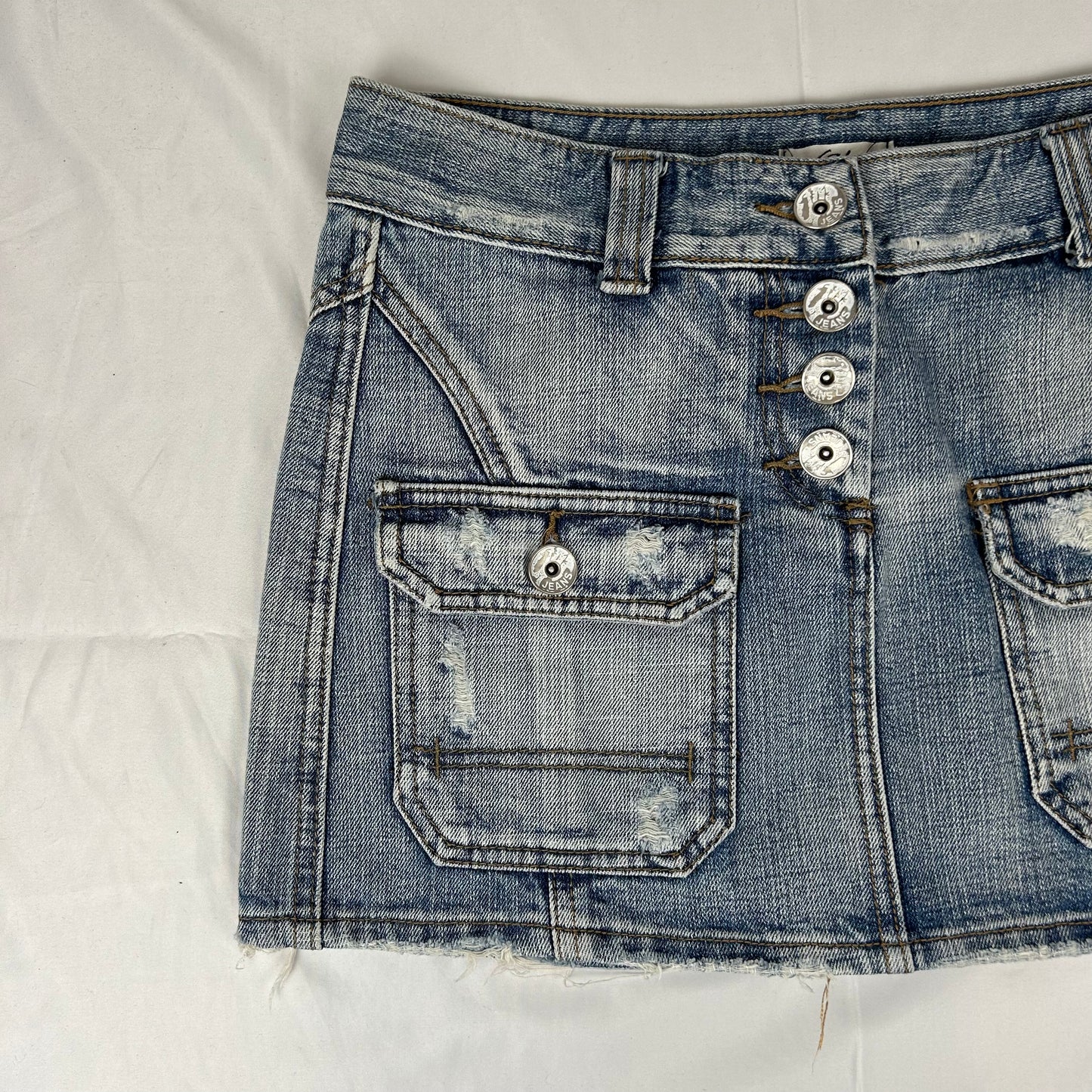 Vintage y2k style faded denim mini skirt