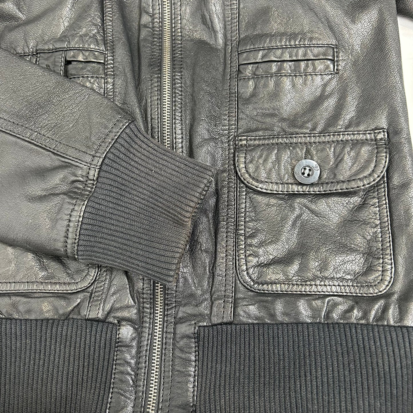 Vintage y2k style black leather jacket