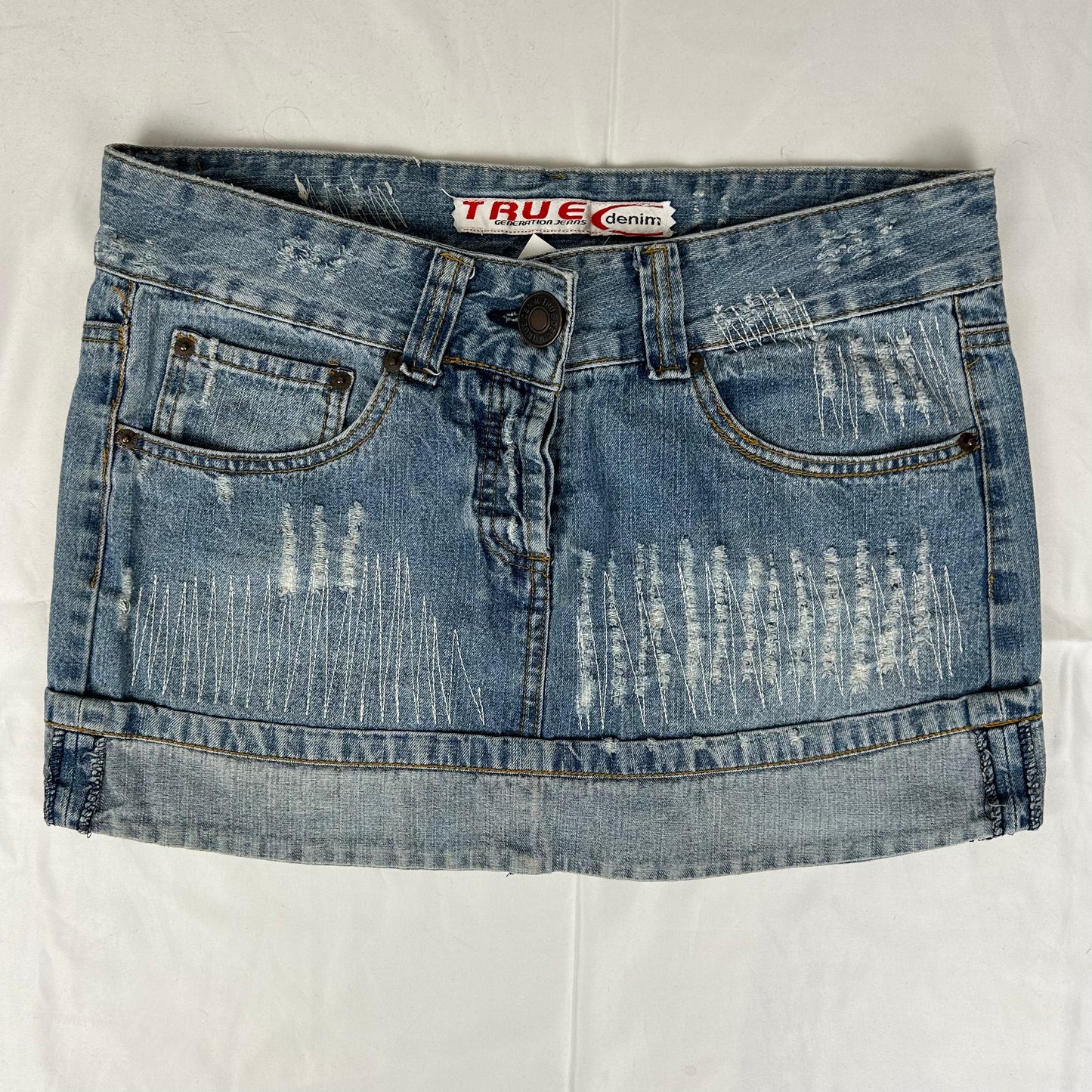 Vintage y2k style distressed denim mini skirt