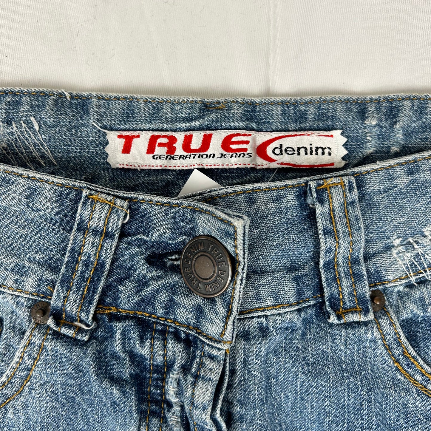 Vintage y2k style distressed denim mini skirt