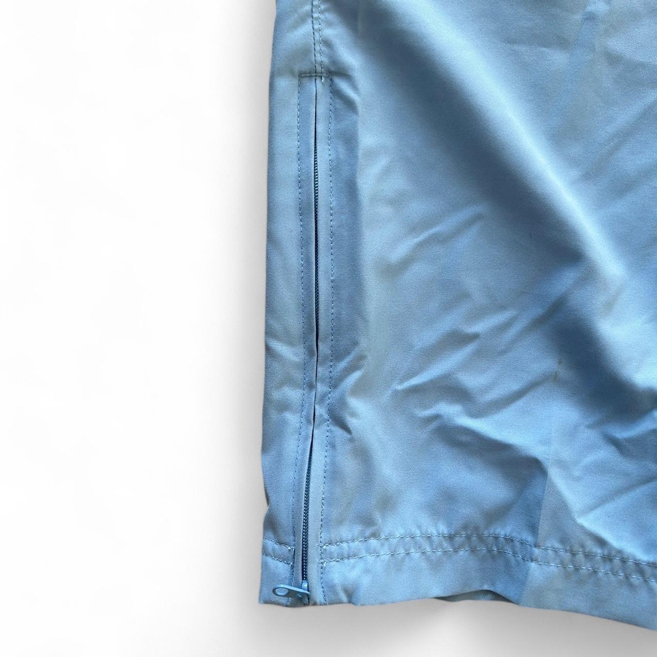 Vintage Y2K style blue Nike track pants