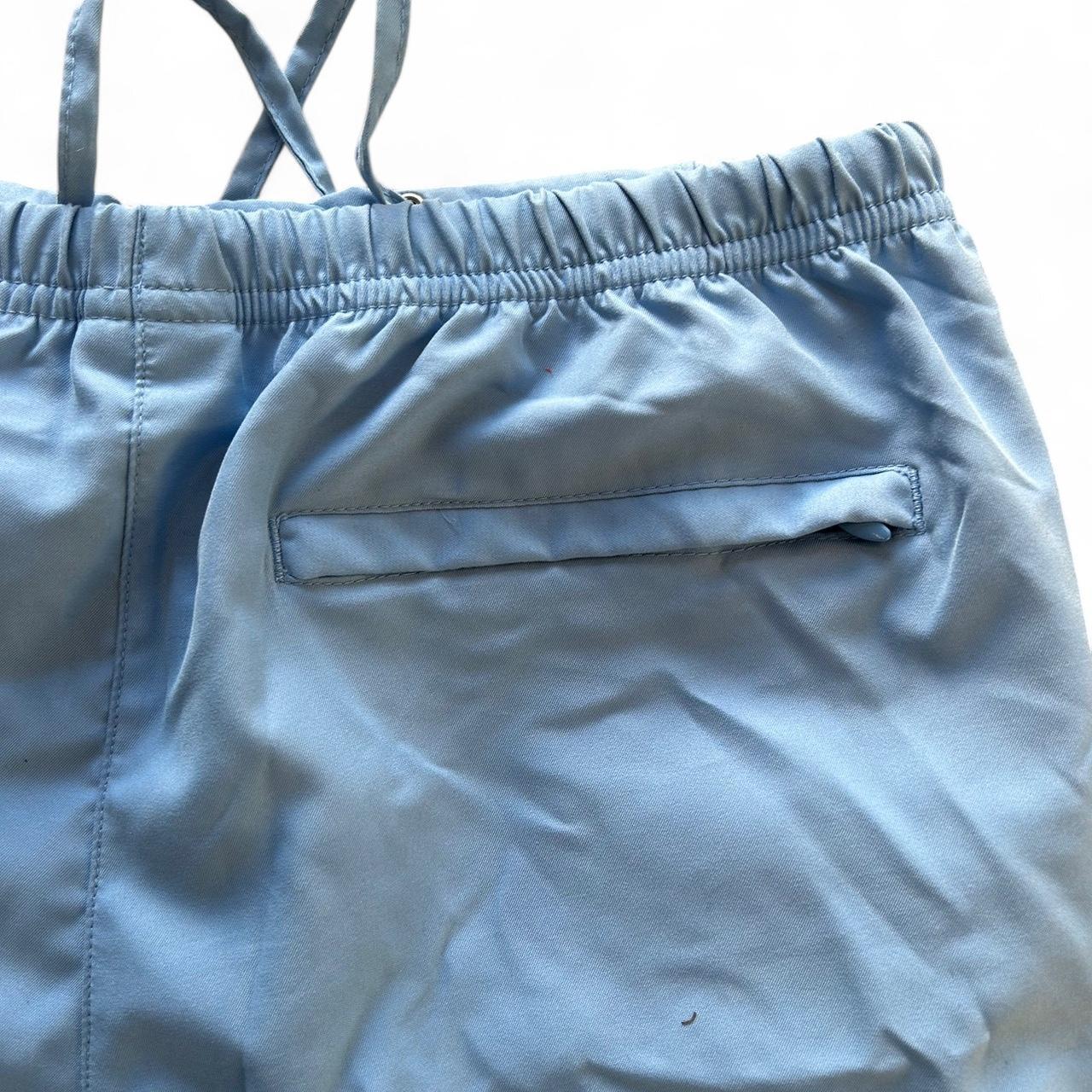 Vintage Y2K style blue Nike track pants