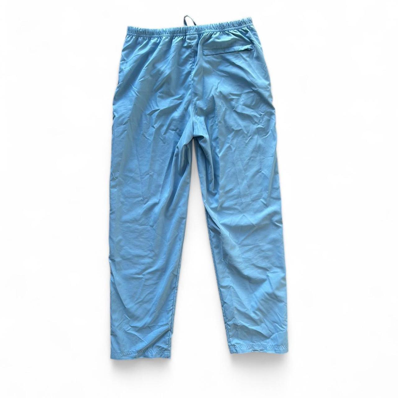 Vintage Y2K style blue Nike track pants