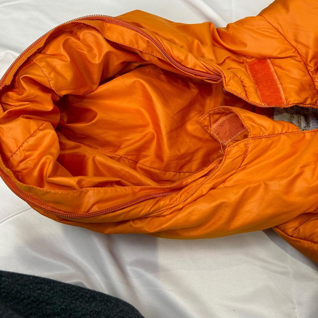 Vintage y2k style orange puffer jacket
