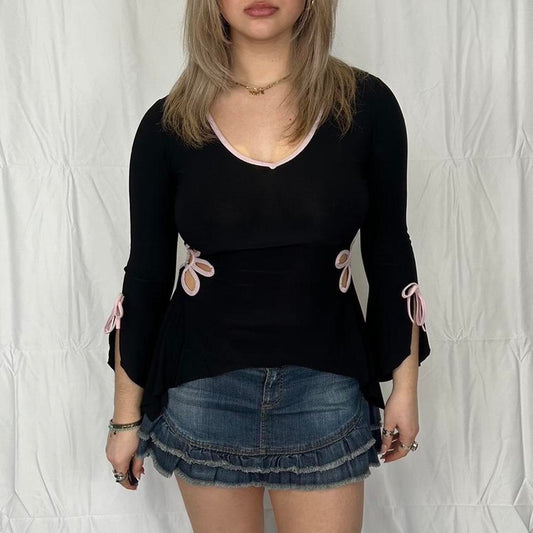 Vintage y2k style black and pink long sleeve top with floral cut outs