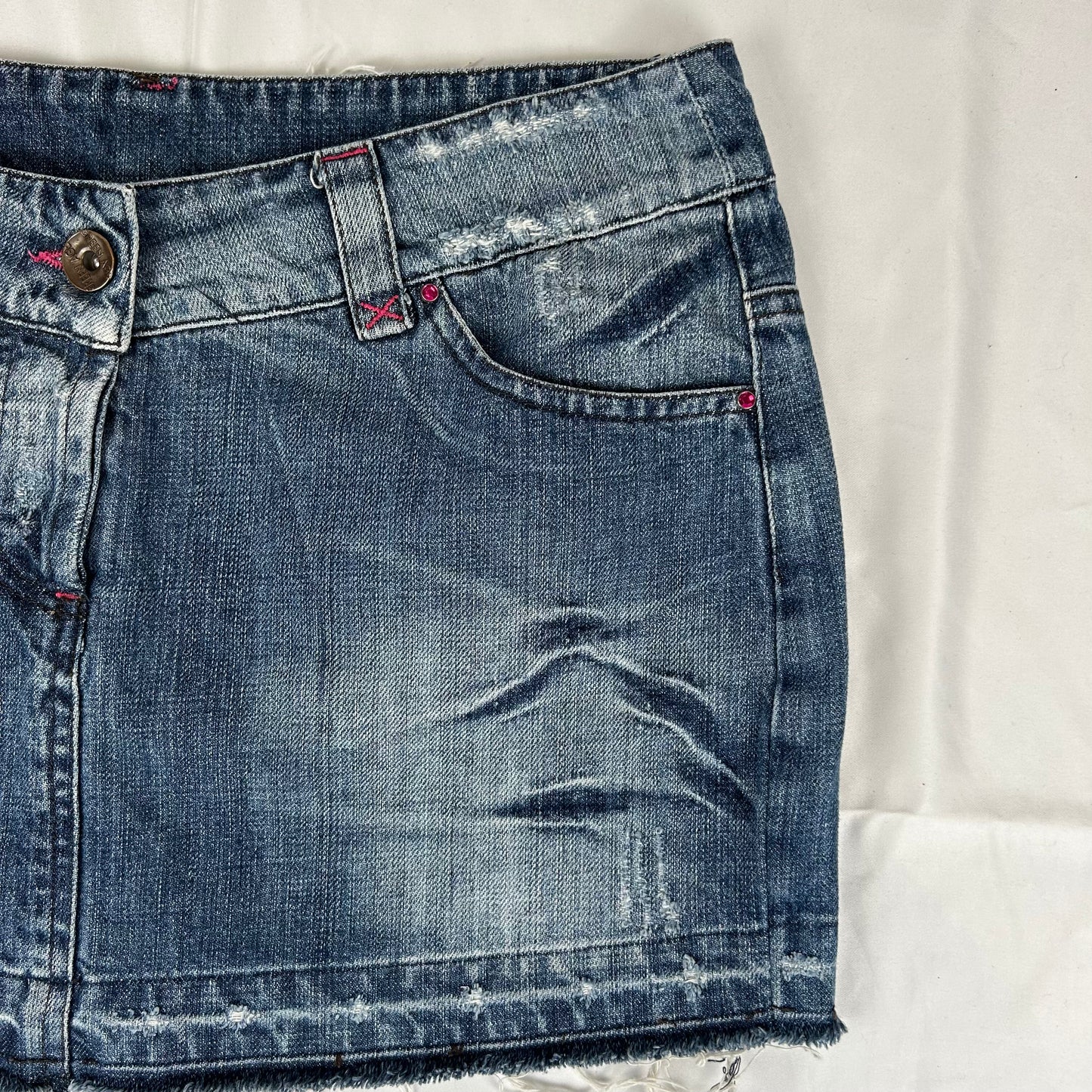 Vintage y2k style dark wash distressed denim mini skirt